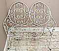 old 2 seater iron bench